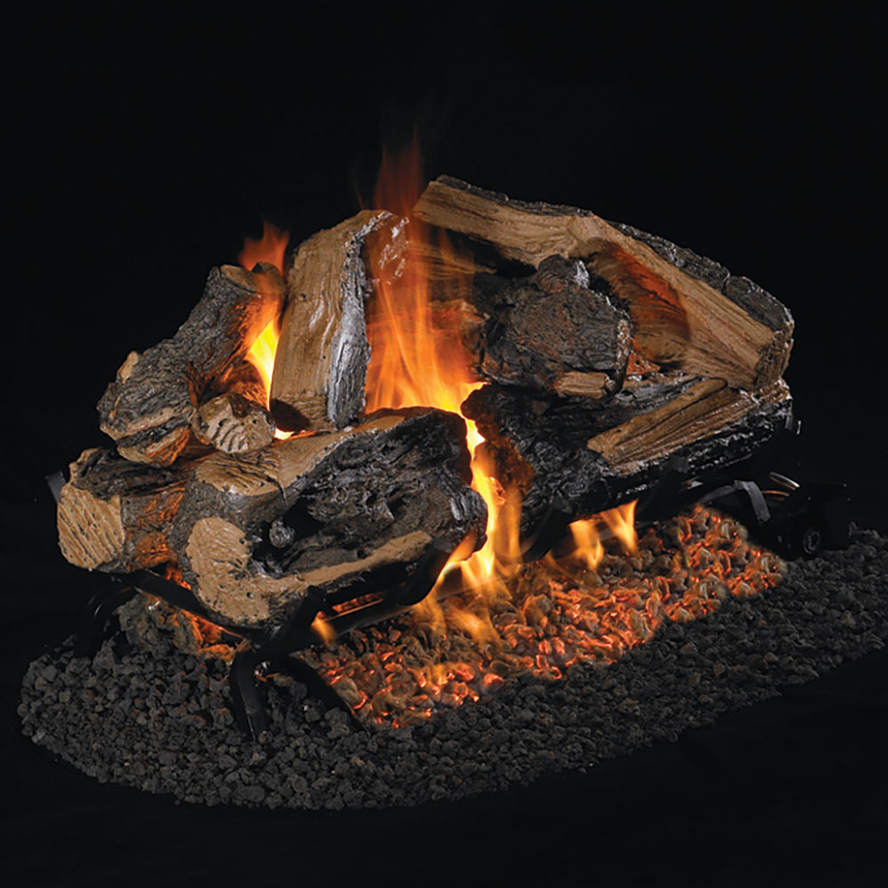 Charred split oak vented gas logs with burning flames and glowing embers