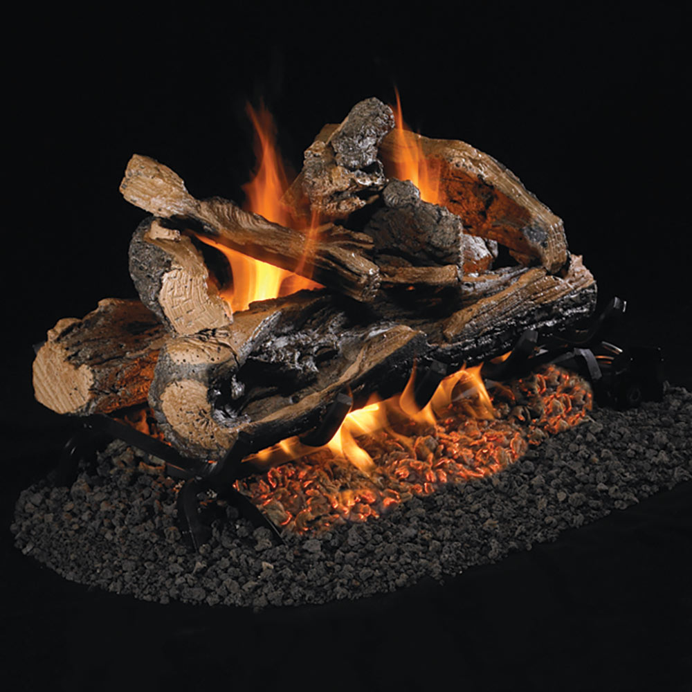 Charred oak-style gas log set with glowing flames and ember bed