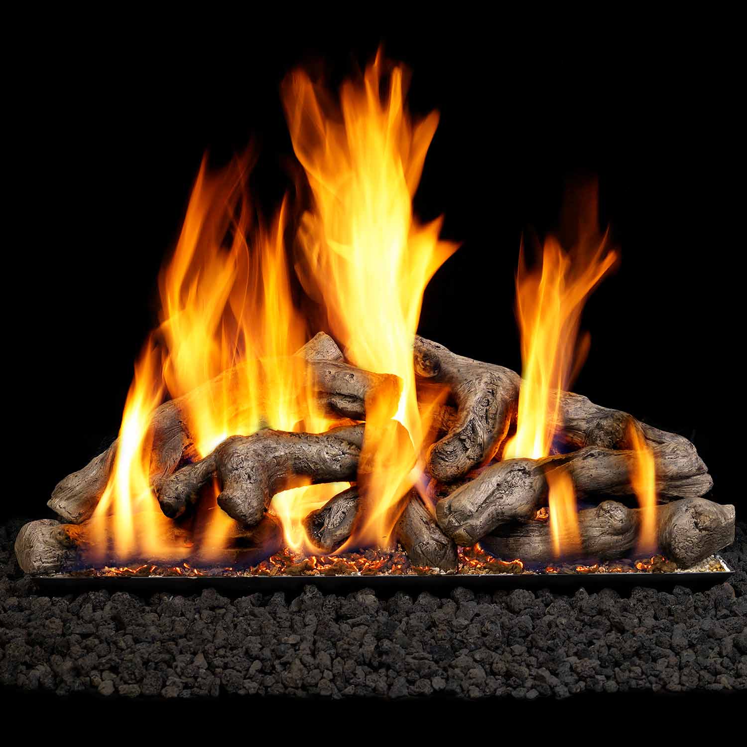 Vented gas log set with burning driftwood logs and glowing ember bed