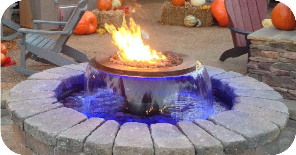 Fire-water bowl insert with flames and blue water sheet rising around burner