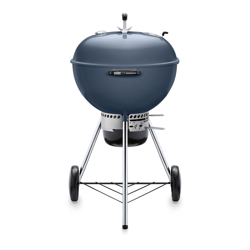 22-inch kettle charcoal grill with dark blue lid, side vents, four legs and wheels