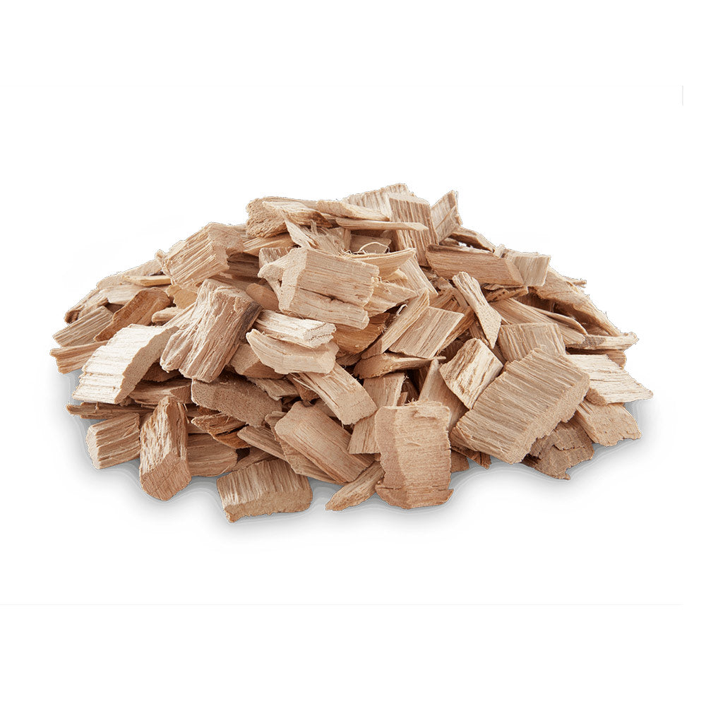 Pecan wood chips pile of light tan and pale brown wood pieces for grilling