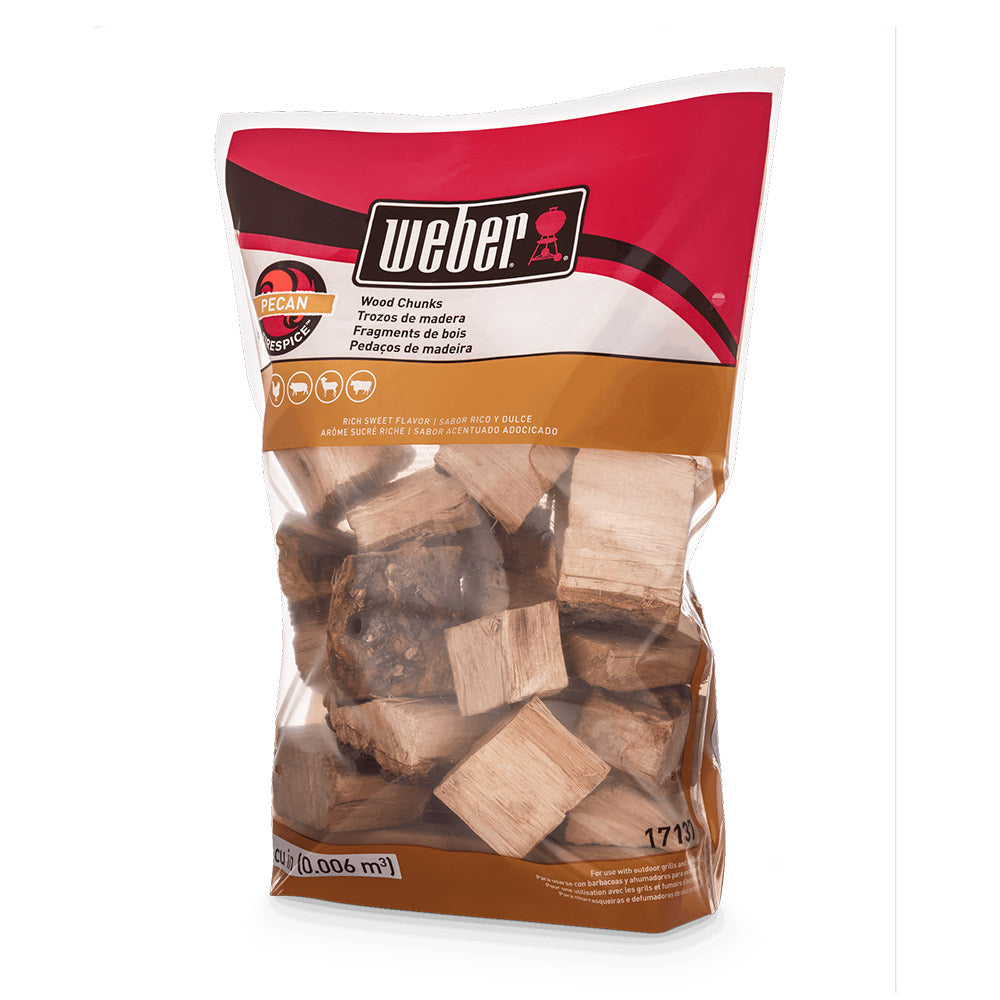 Weber pecan wood chunks in clear bag with red and brown label
