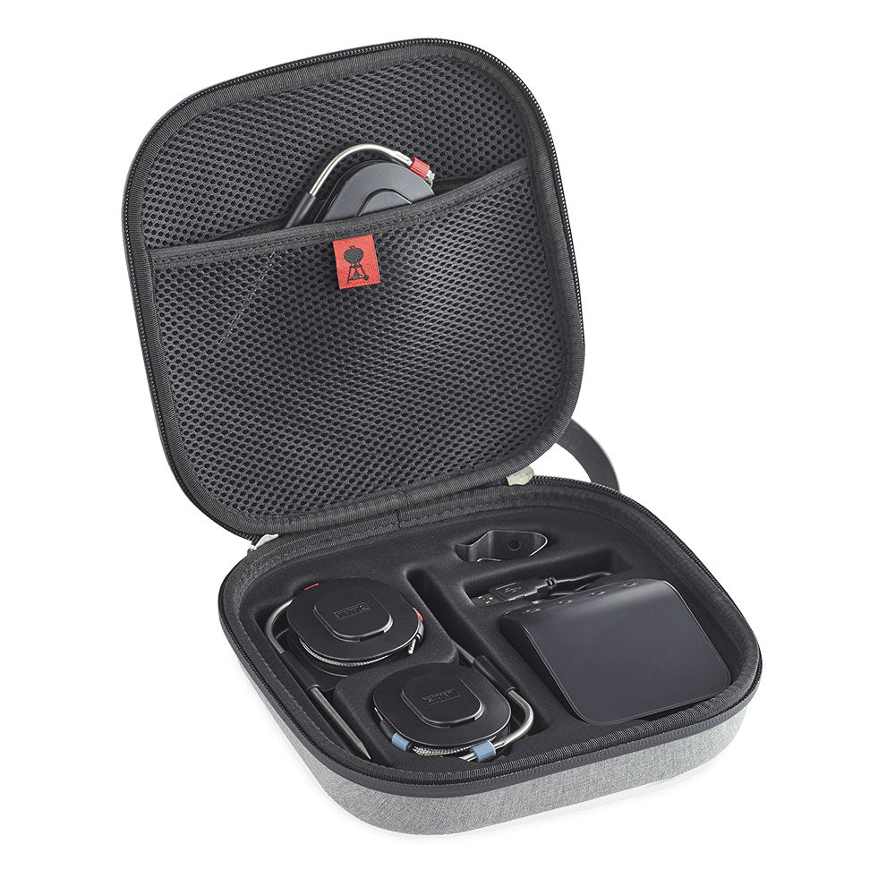Storage case open with devices in molded slots and protective padding