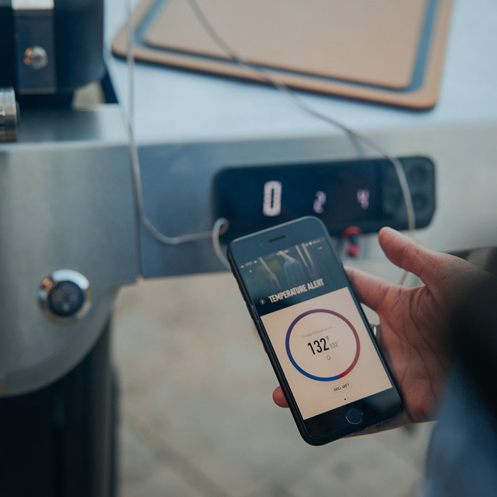 Smartphone app showing grill temperature from a wireless probe near the grill