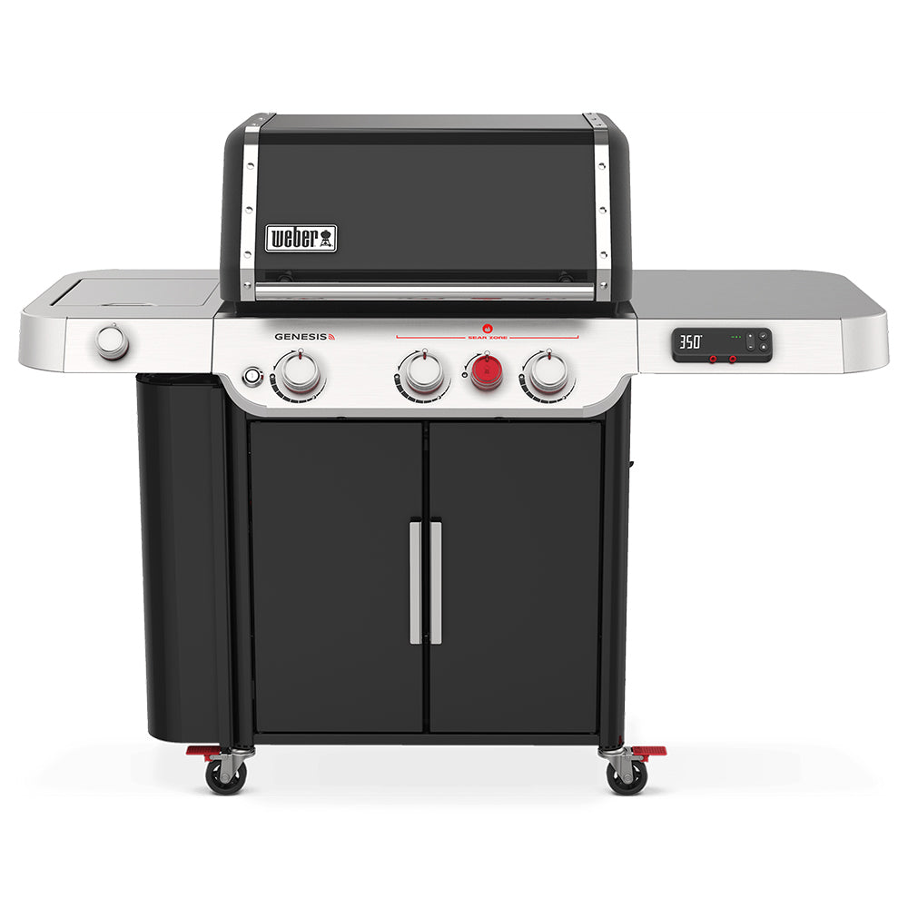 Stainless steel and black freestanding gas grill with closed lid and control knobs