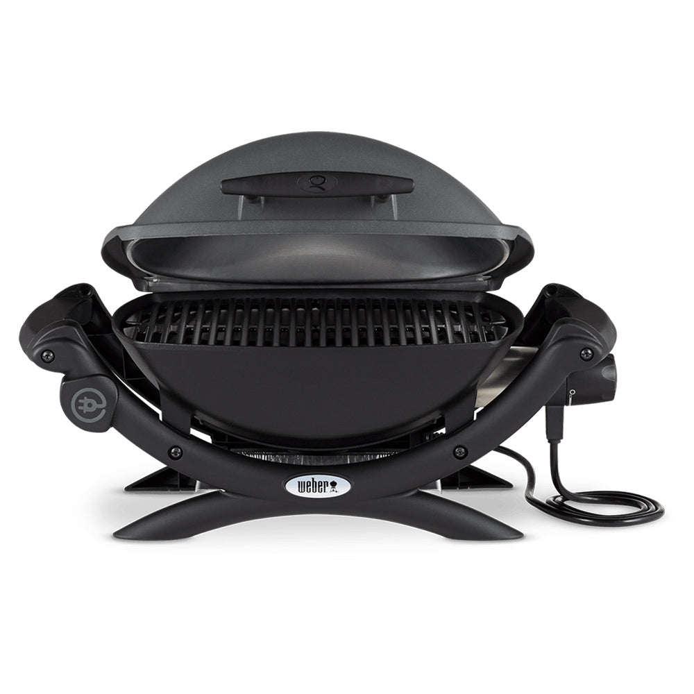 Electric grill with open lid, black cooking grate, side handles, power cord