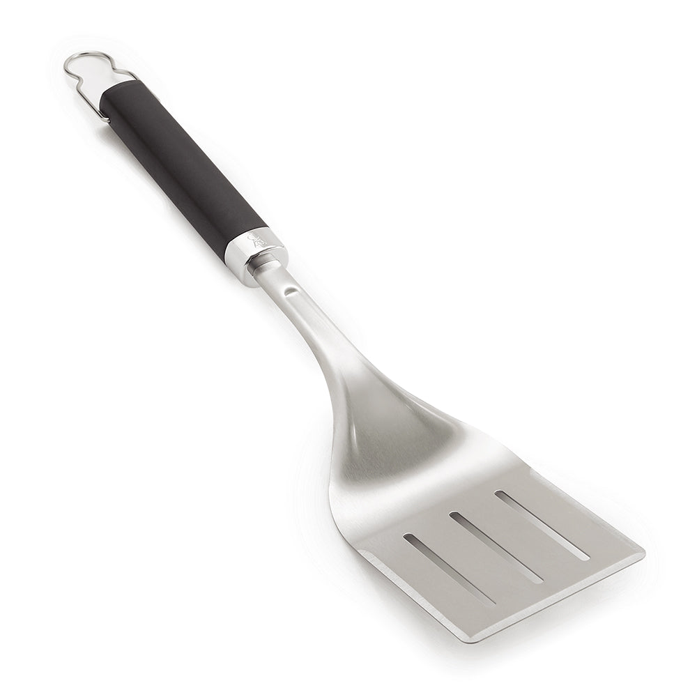 Stainless steel grill spatula angled view with black handle