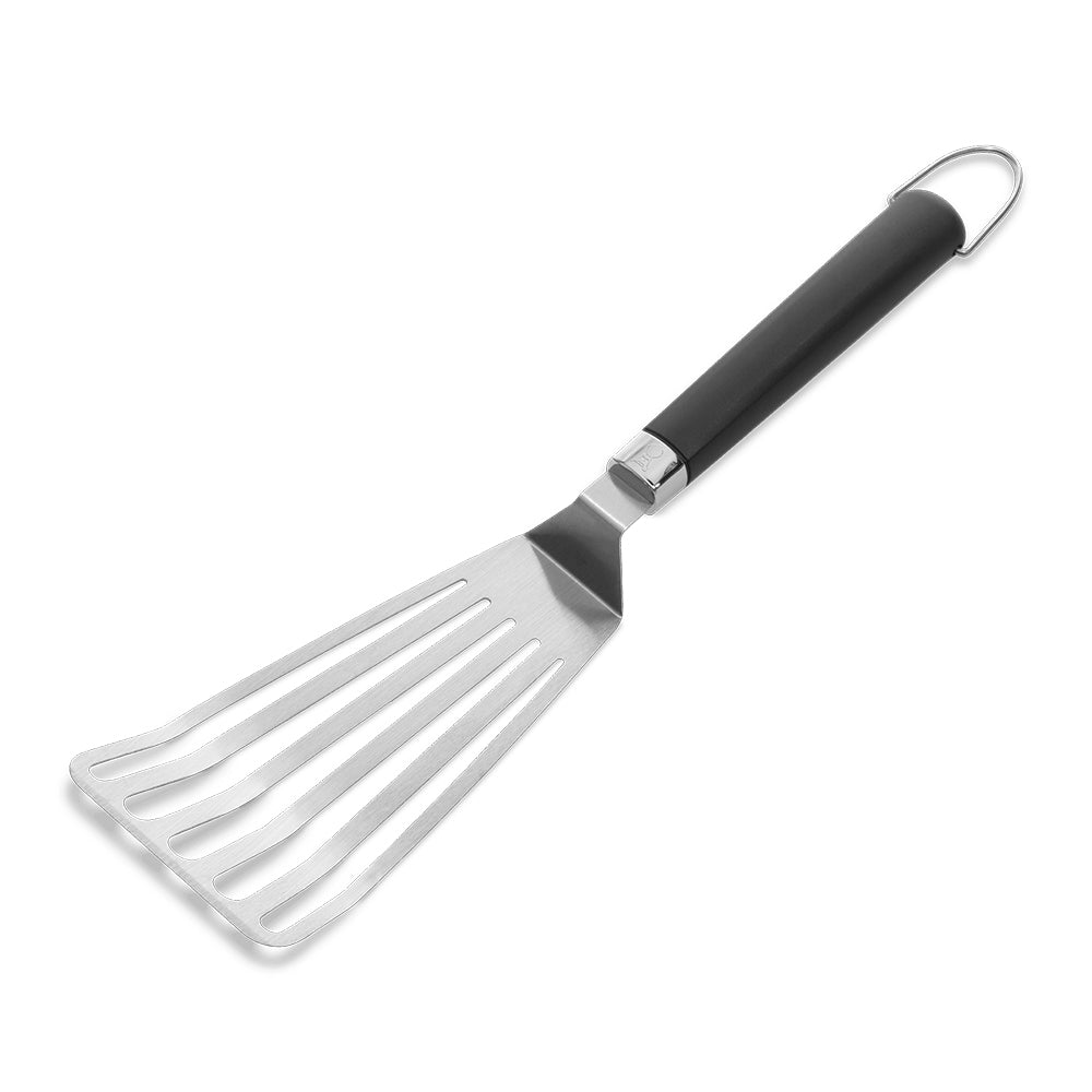 Weber flexible griddle spatula, angled view, black handle and slotted blade