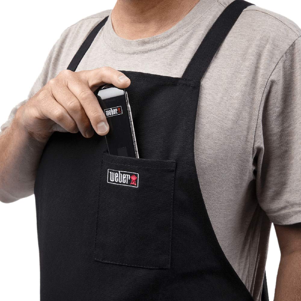 Black crossback apron front with pocket and Weber logo patch