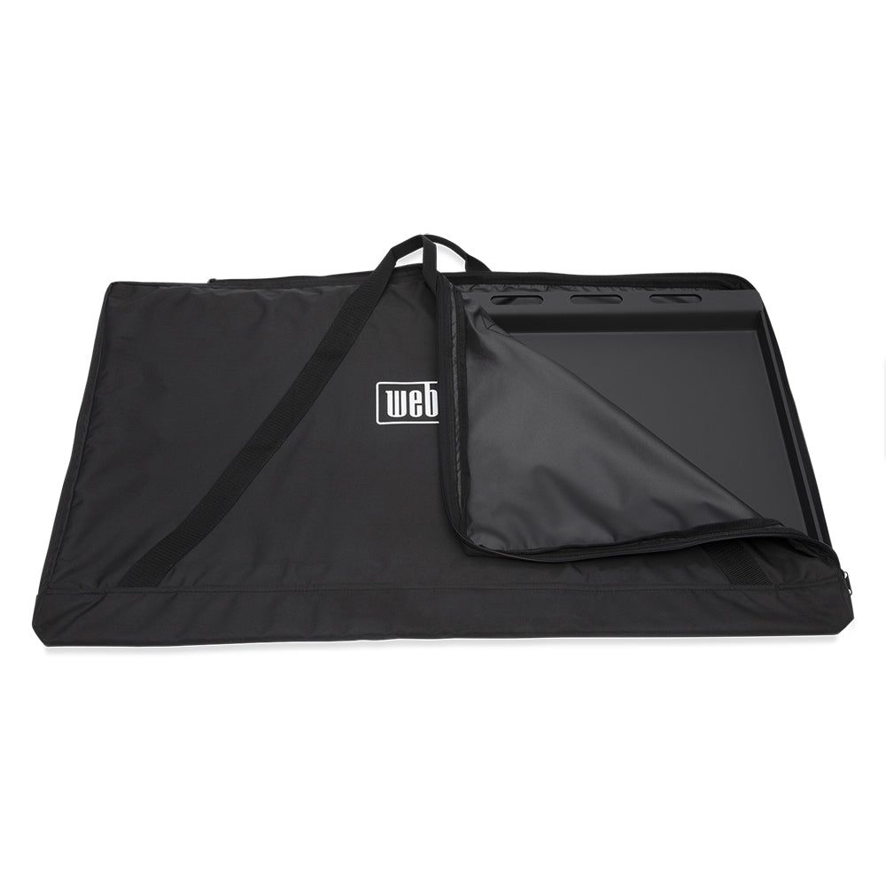 Weber griddle storage bag with open flap and interior pocket for griddle