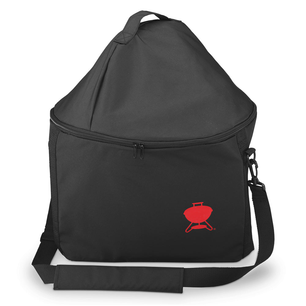 Dark carry bag with zipper, shoulder strap, and red grill logo on front.