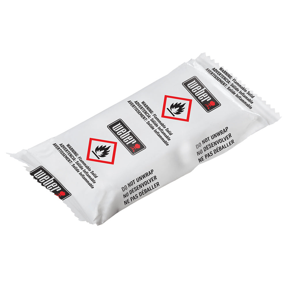 Fire starter sheets, two wrapped packets with leaf-and-flame icons