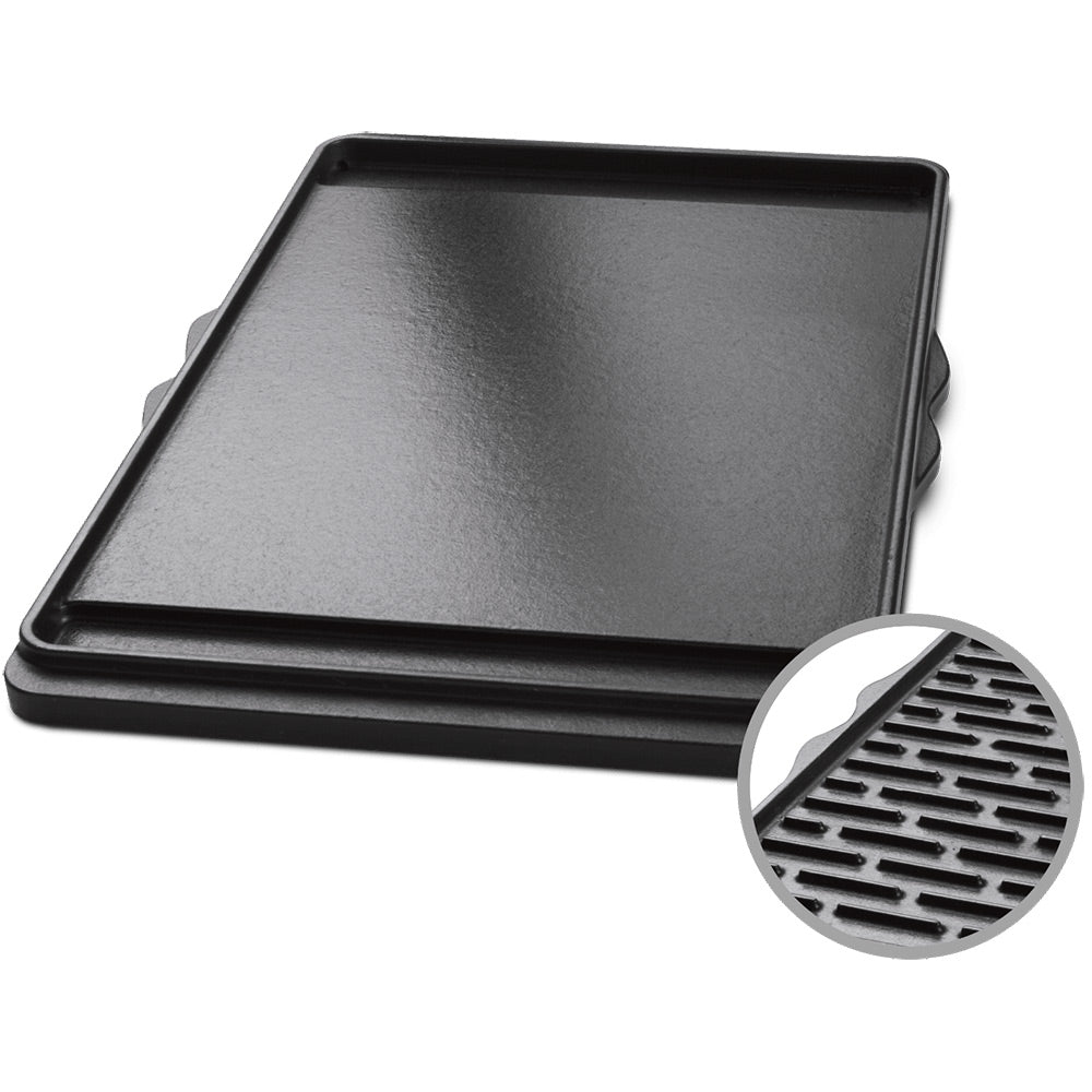 Porcelain-enameled cast-iron griddle pan with raised rim and two side handles, dark finish