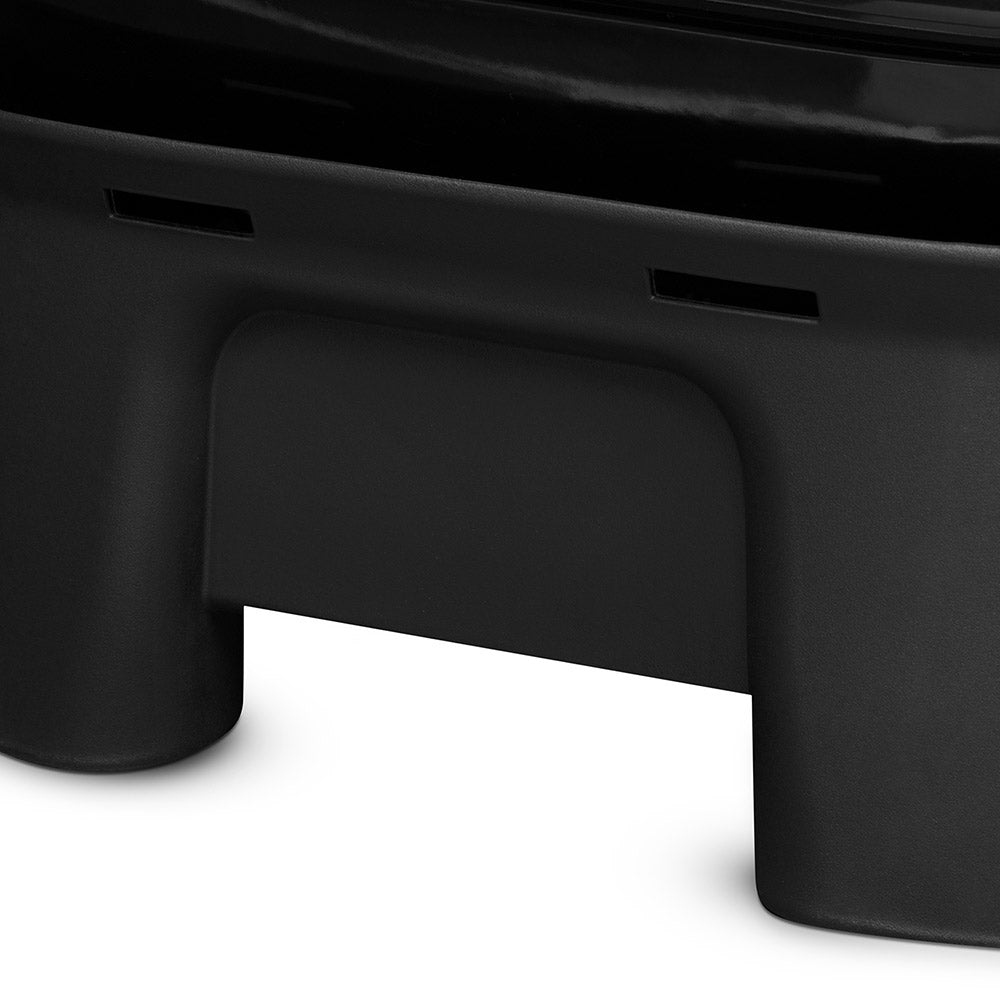 Air vent openings on the bottom of a black portable electric grill