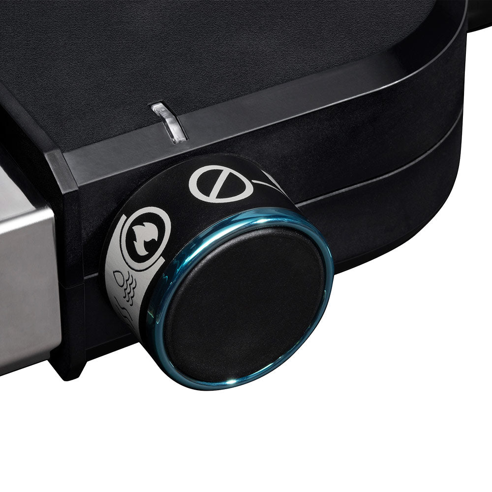 Black grill control knob with blue-lit ring and icon markings.