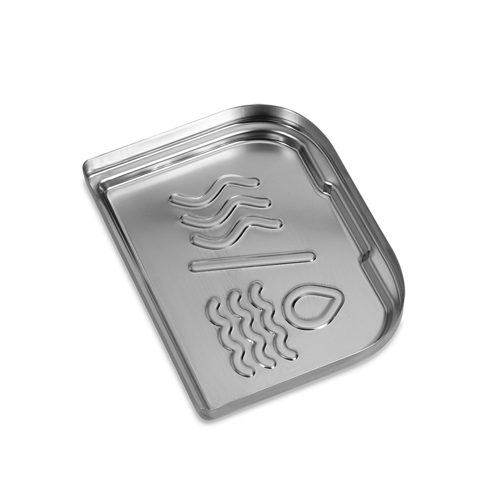 Metal grill plate tray insert with raised grill-shape icons.