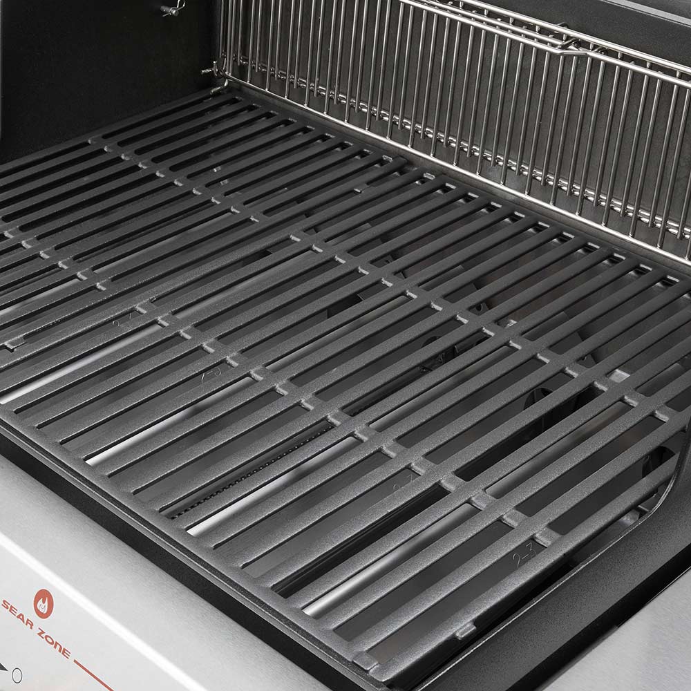 Black grill grates with parallel bars and a wire warming rack