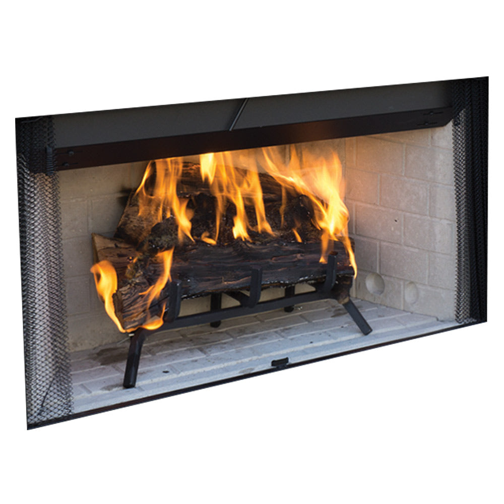 Wood-burning fireplace with screen and open fire burning in the firebox