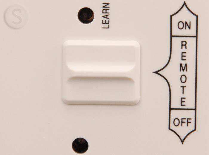 White remote receiver with ON, REMOTE, and OFF switch panel