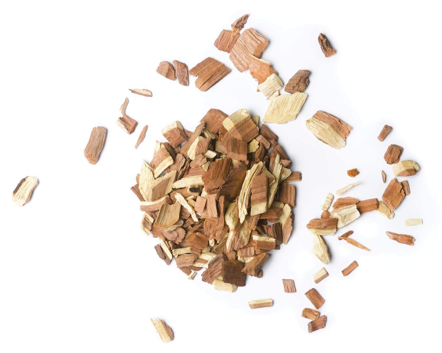 Apple wood chips, small brown wood pieces in a loose pile