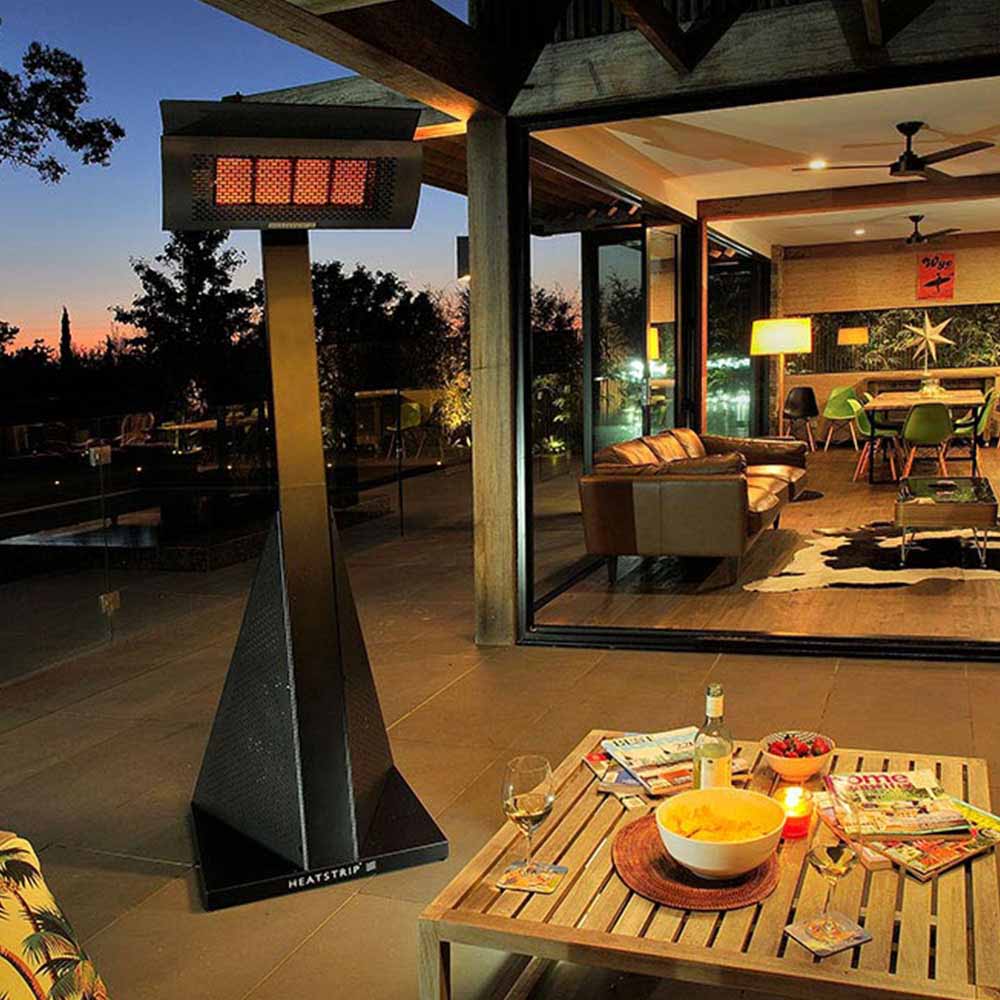 Outdoor LPG gas patio heater with black heat panel and glowing red-orange grid