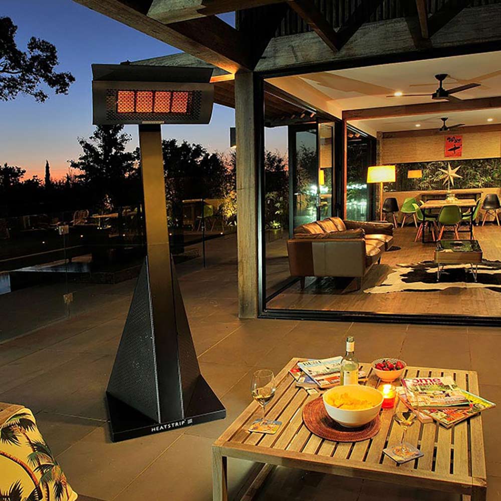 Outdoor patio LPG gas heater with rectangular glowing infrared burner on stand