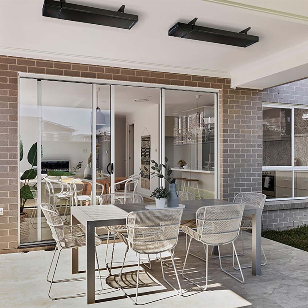 Ceiling-mounted outdoor electric patio heater with slim black heater housing
