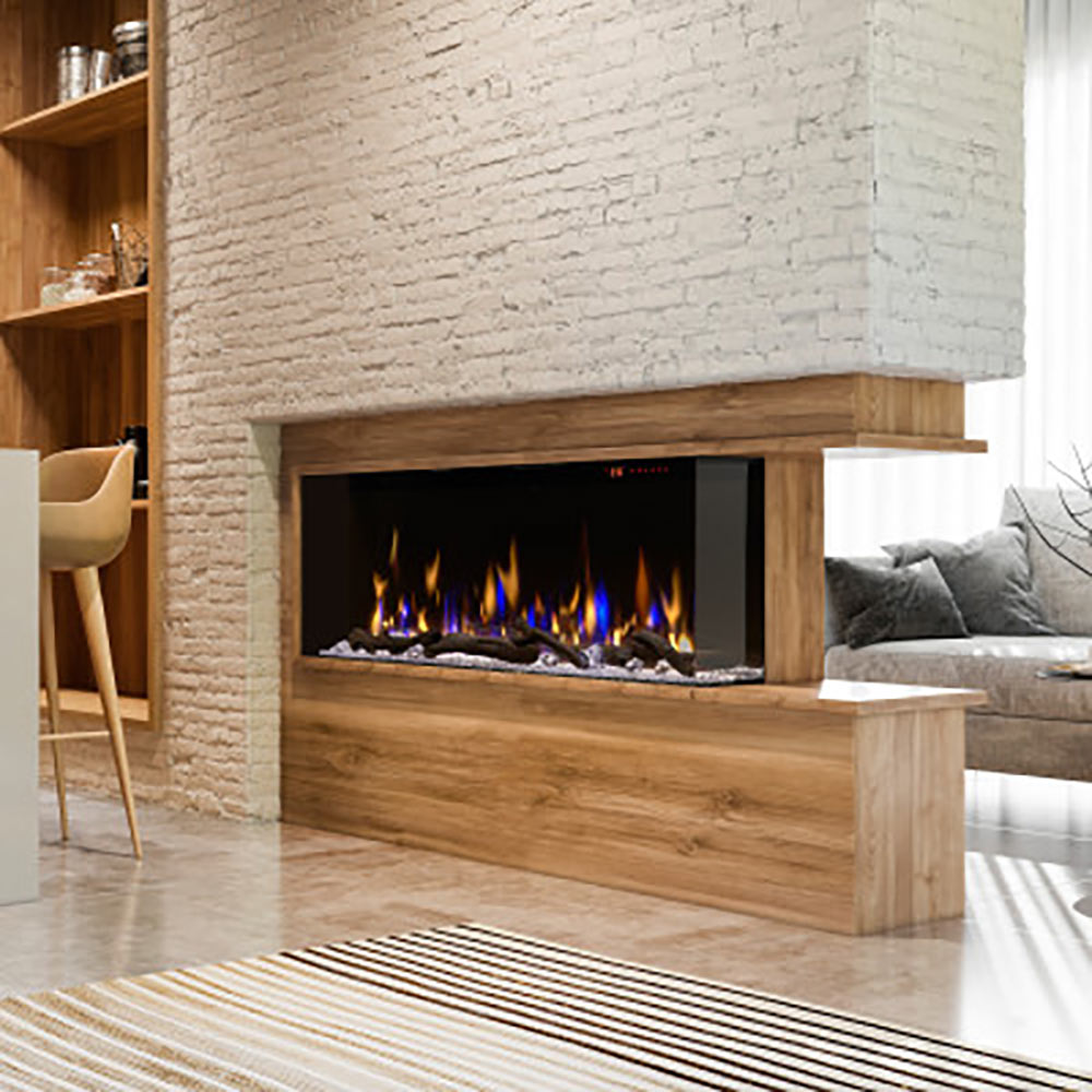 Linear electric fireplace with glowing multicolor flames in a wood base and white stone surround