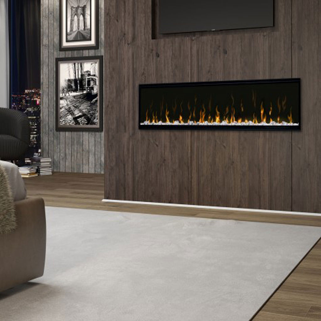 Built-in linear electric fireplace in wood-paneled wall with flame effect