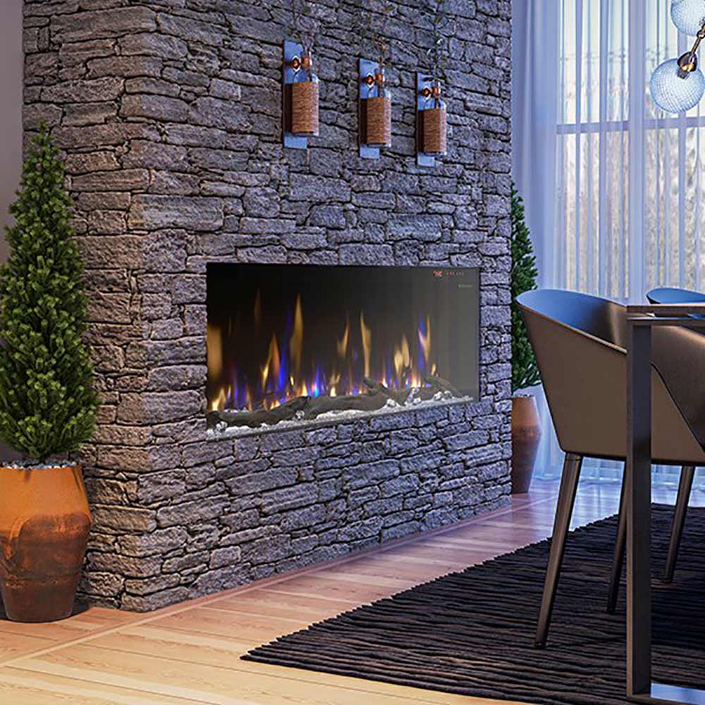Built-in linear electric fireplace in stone wall with flame effect screen