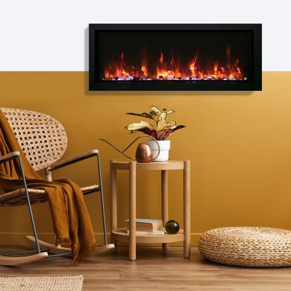Wall-mounted slim electric fireplace with black frame and realistic orange flame effect