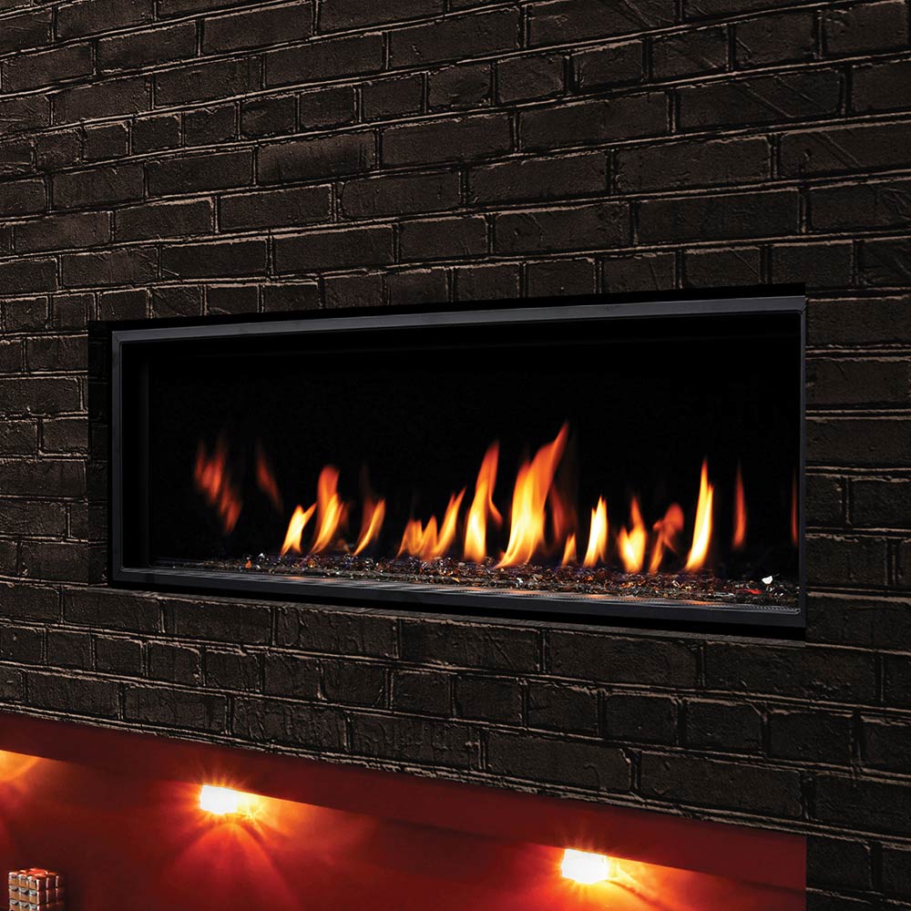 Linear direct vent gas fireplace with black frame, bright flames over dark fire glass