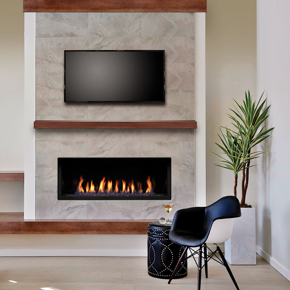 Linear direct vent gas fireplace with black surround and visible flames, wall-mounted