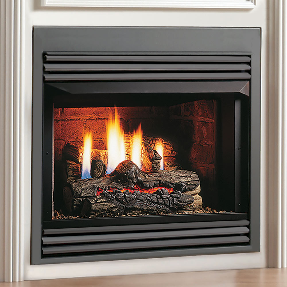 Vent-free gas firebox front with vented trim, glowing embers and burning logs
