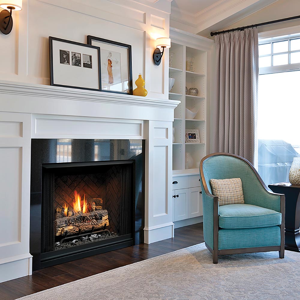 Black vent-free gas firebox with log set and flames in mesh fire screen
