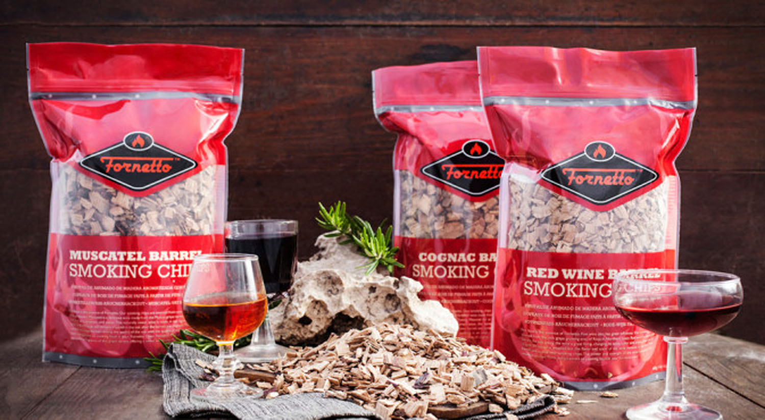 Multiple Fornetto smoking wood chip pouches with wood chips and glasses
