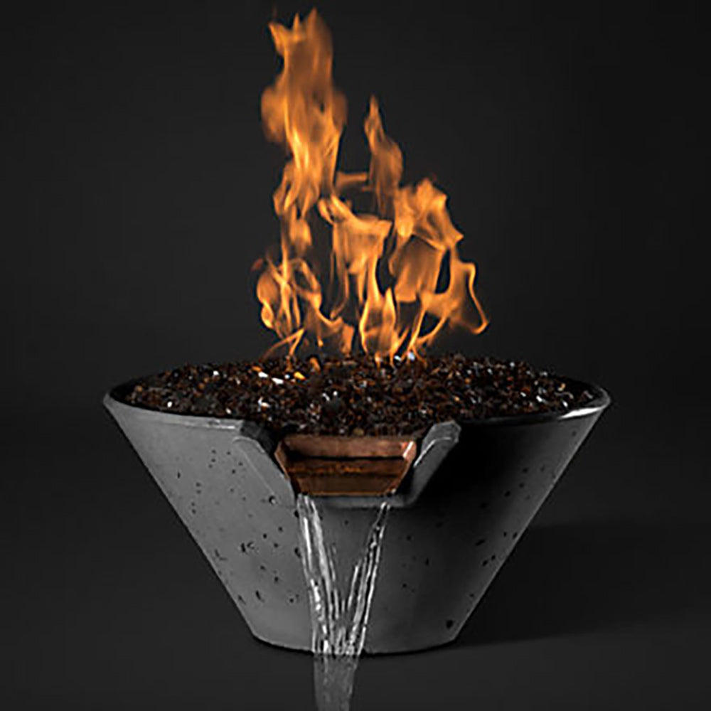 Metal fire pit bowl with glass fire media and visible flames