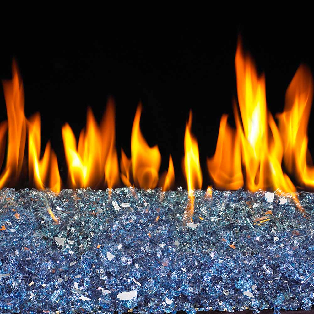 Blue fire glass crushed bed with visible flames from a fire pit