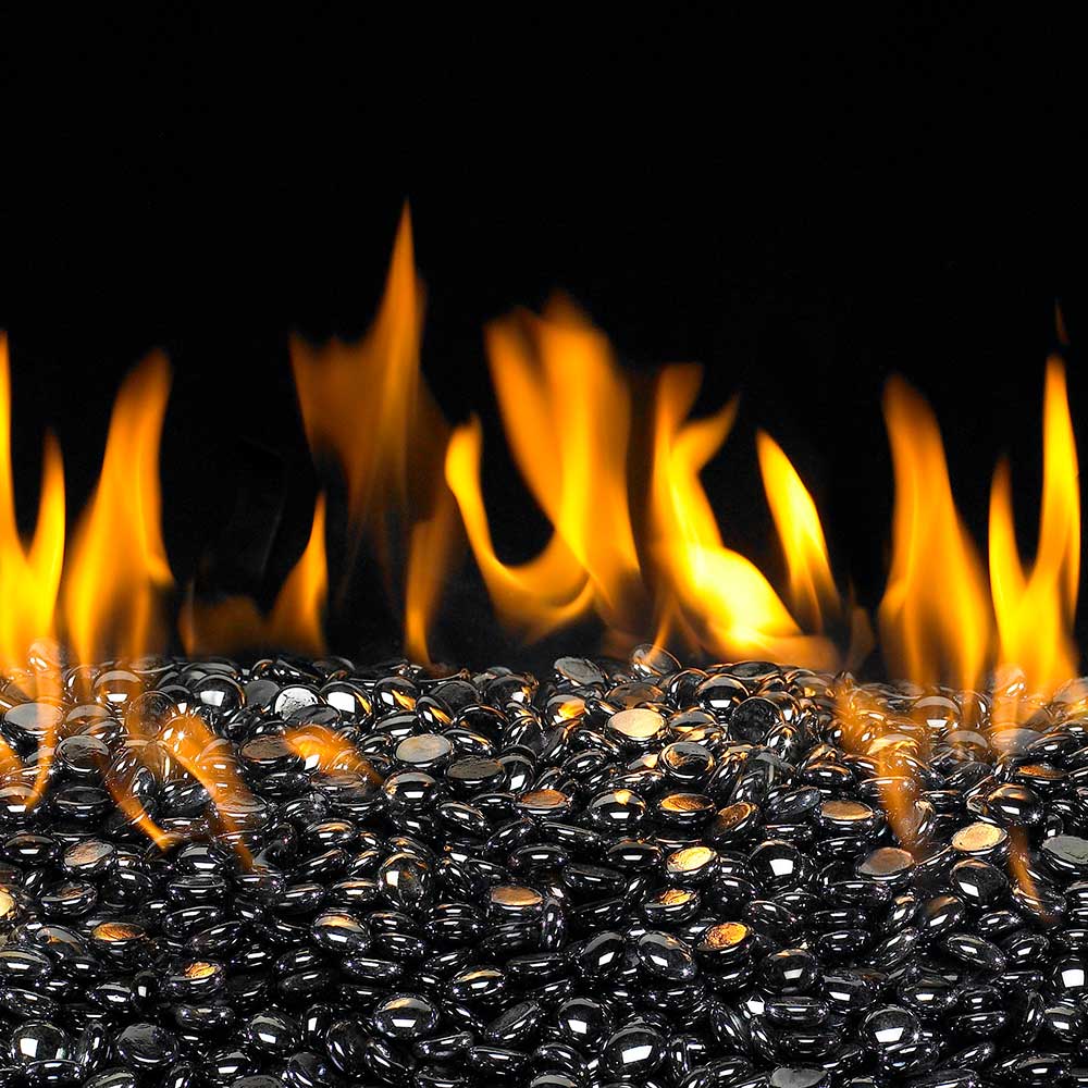 Black fire pit gems in a shallow pile