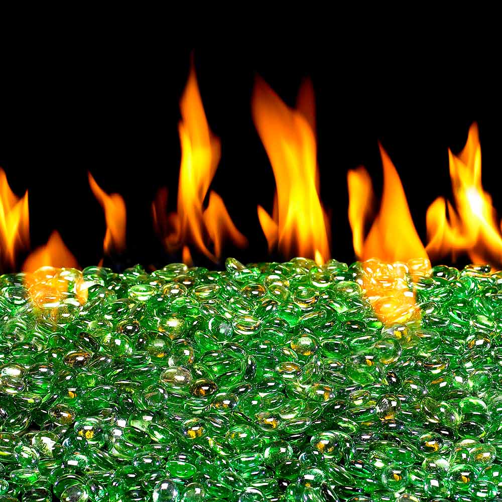 Green fire glass gems scattered across base with flames behind