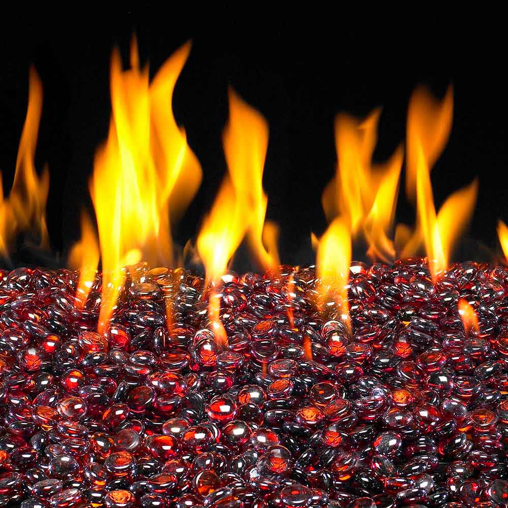 Glass fire gems with flames over a bed of red and dark stones