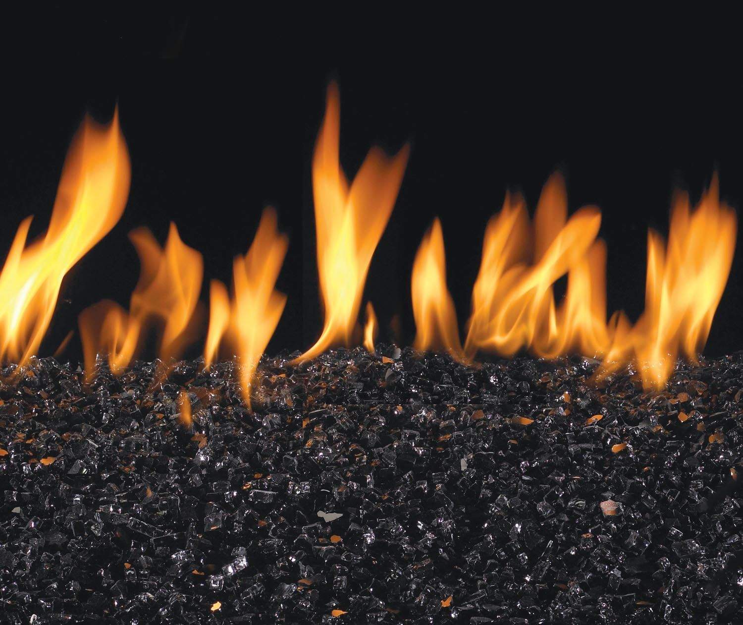 Vented glass burner with dark fire glass media and orange flames