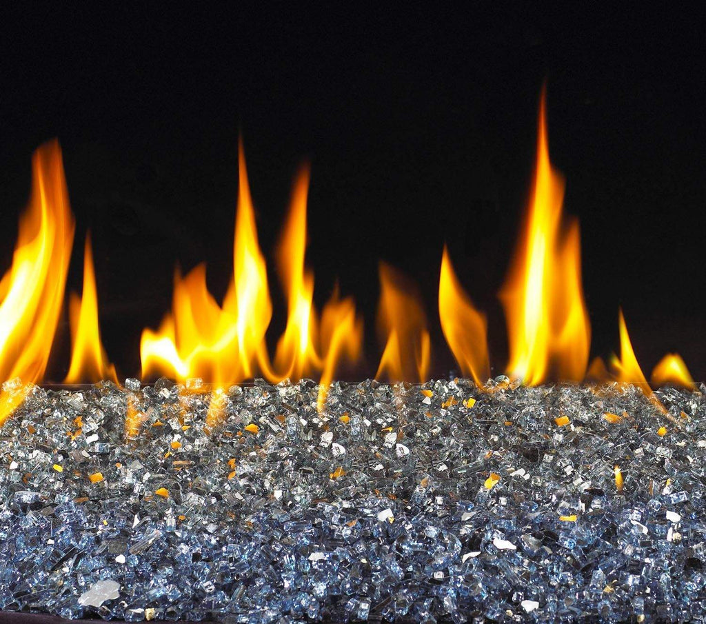 Vent-free glass burner kit with flames above blue-tinted glass fire media