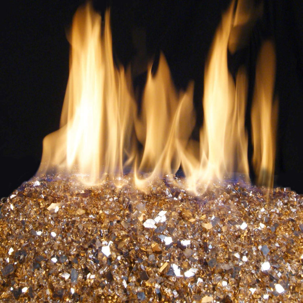 Vented glass burner with golden-tinted glass media and orange flames