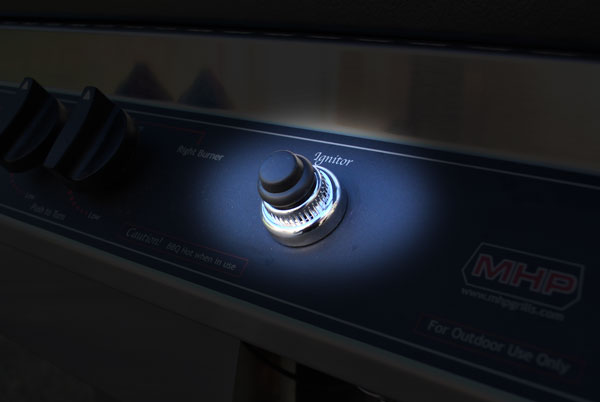Gas grill control panel with burner knob and MHP ignition label