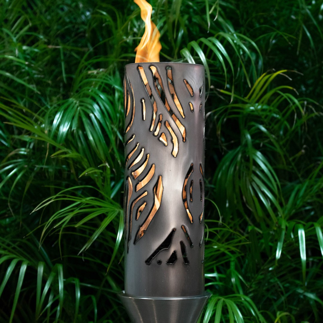 Outdoor flame torch with perforated metal sleeve and burning tip