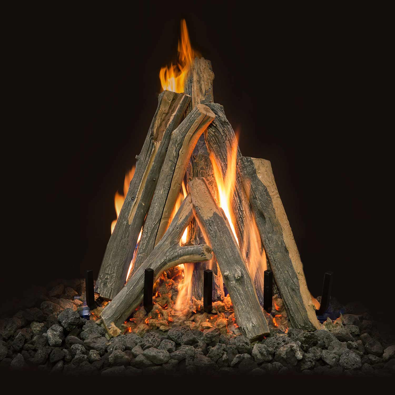 Juniper-style gas fire logs with open flames and dark lava rocks