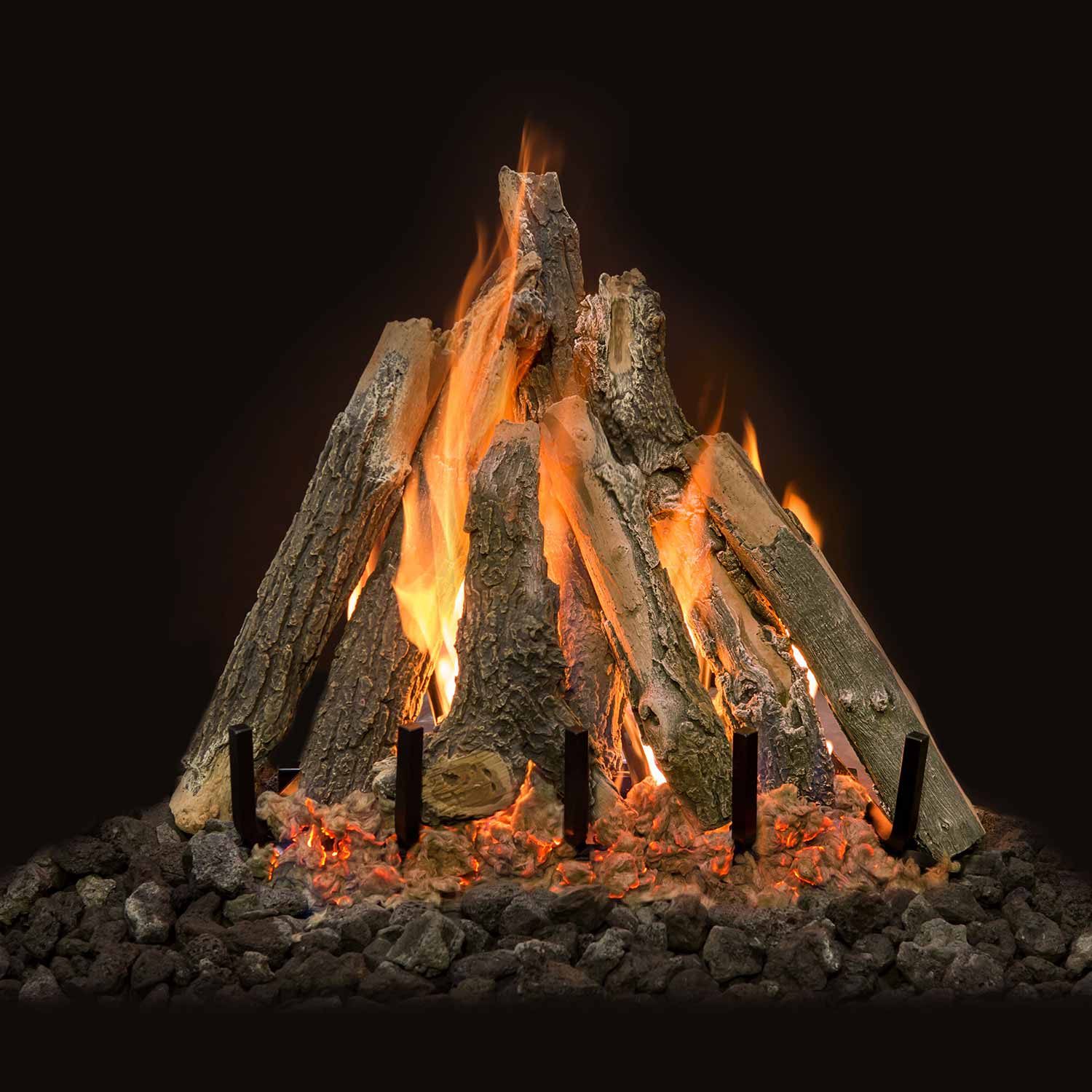 Kiva-style gas logs set with burning flames and dark lava rocks