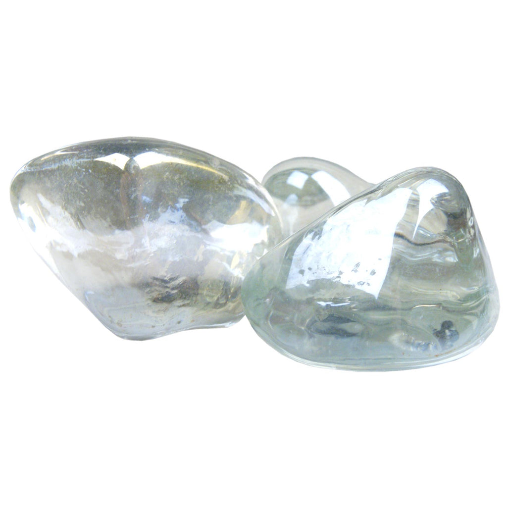 Clear diamond nuggets in a shallow pile, faceted rounded glass pieces